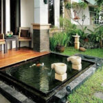 desain kolam ikan teras rumah